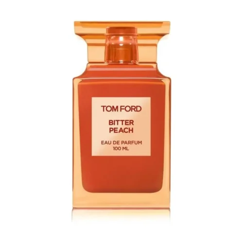 Woda perfumowana Tom Ford Bitter Peach 100 ml w intensywnie pomarańczowym flakonie obok pudełek